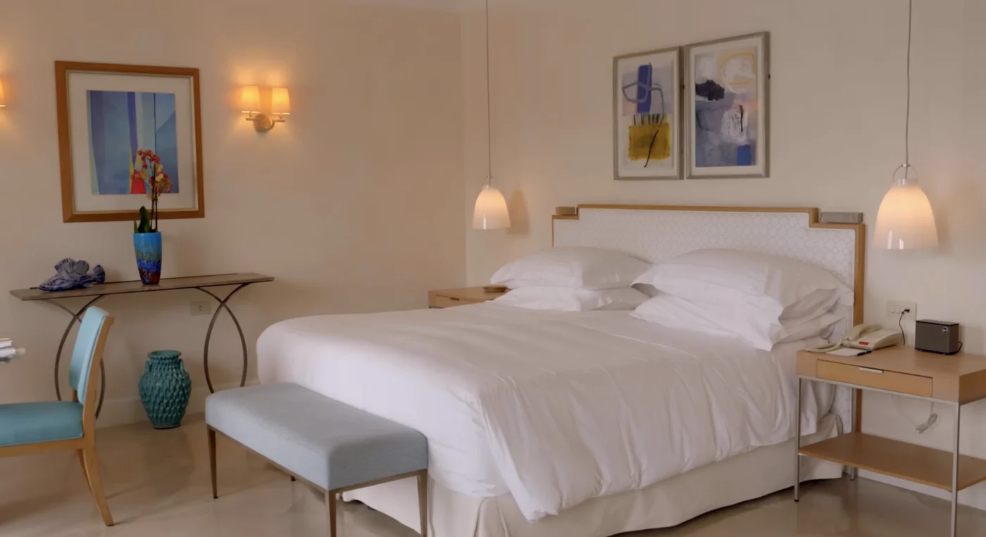 Villa Sant Andrea Taormina Guestroom White Bed Pendant Lights Blue Artwork Contemporary Decor