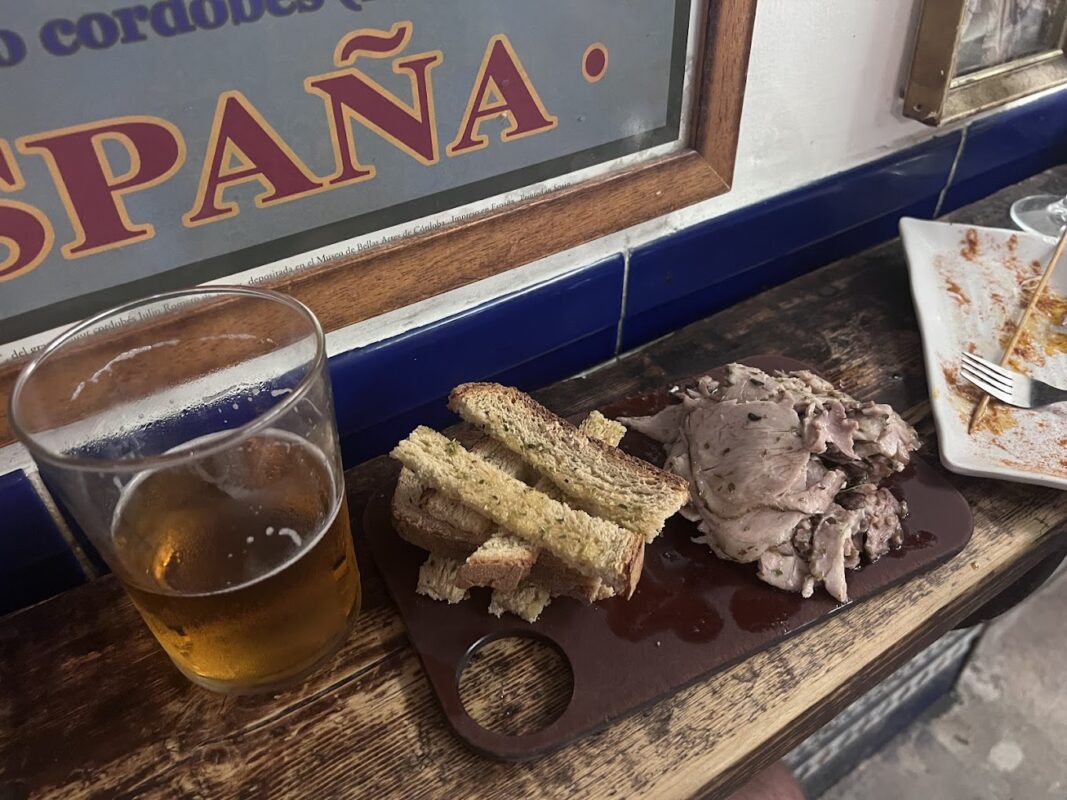 La Tranca bar interior in Malaga Soho neighbourhood, empanadas and vermouth on the bar