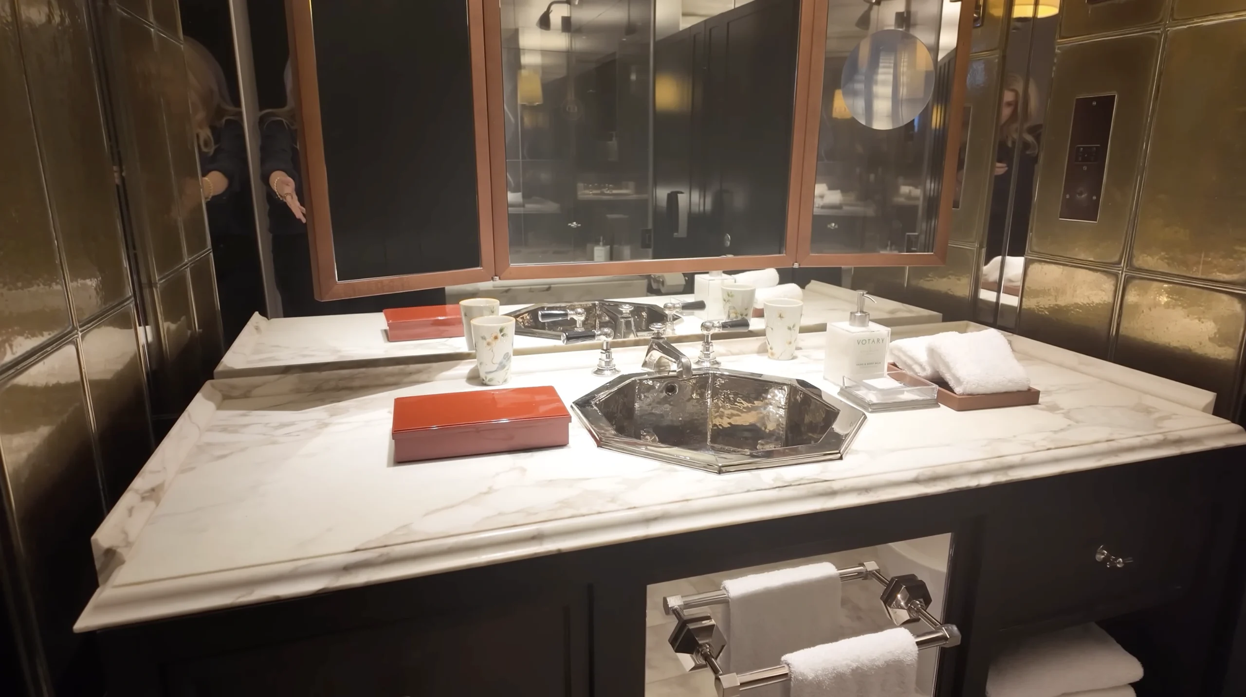 Rosewood London suite bathroom — marble, deep soaking tub and rainfall shower