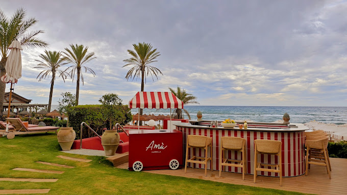 Amù Beach Club at Gran Marbella Resort — infinity pool and beachfront dining on Elviria coast