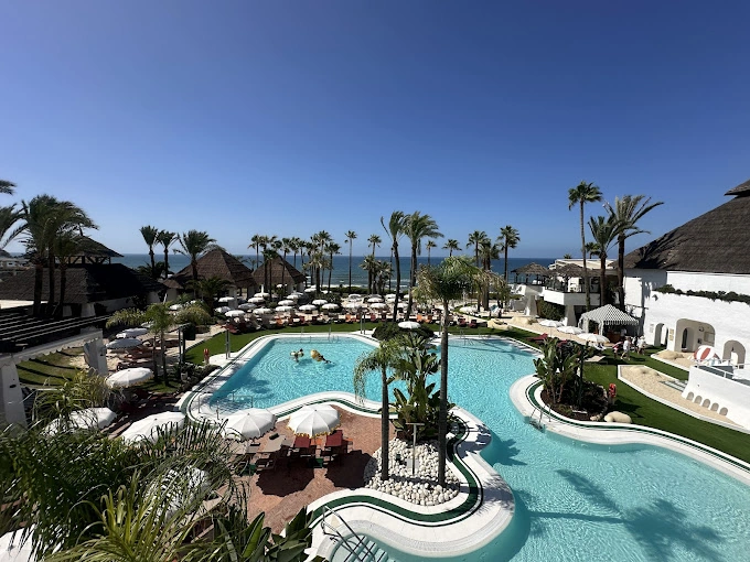 Don Carlos Marbella — outdoor pool set within 20,000 sq m of tropical gardens