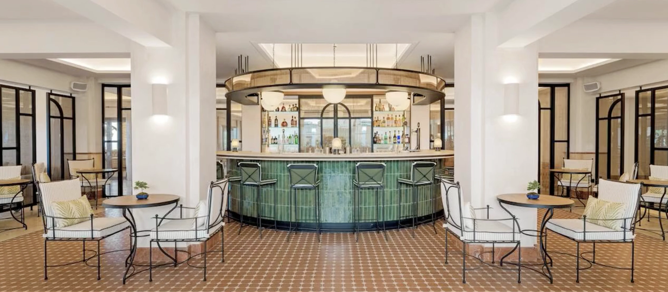 Gran Marbella Resort — circular bar counter, lobby and garden bars
