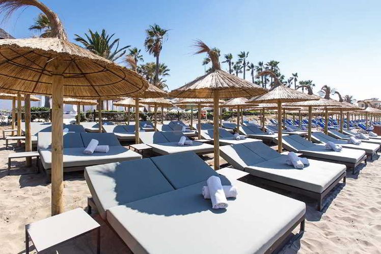 Don Carlos Marbella — private beach and Lucia Beach Club on Elviria beach