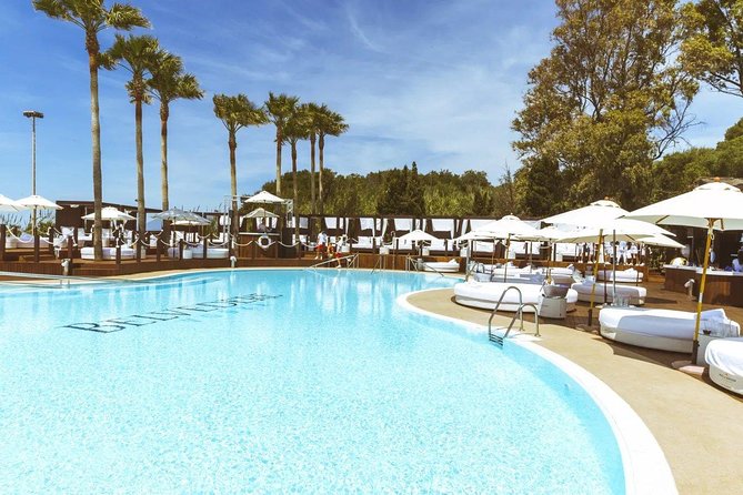 Opium Beach Club Marbella pool and sunbeds with Mediterranean sea views