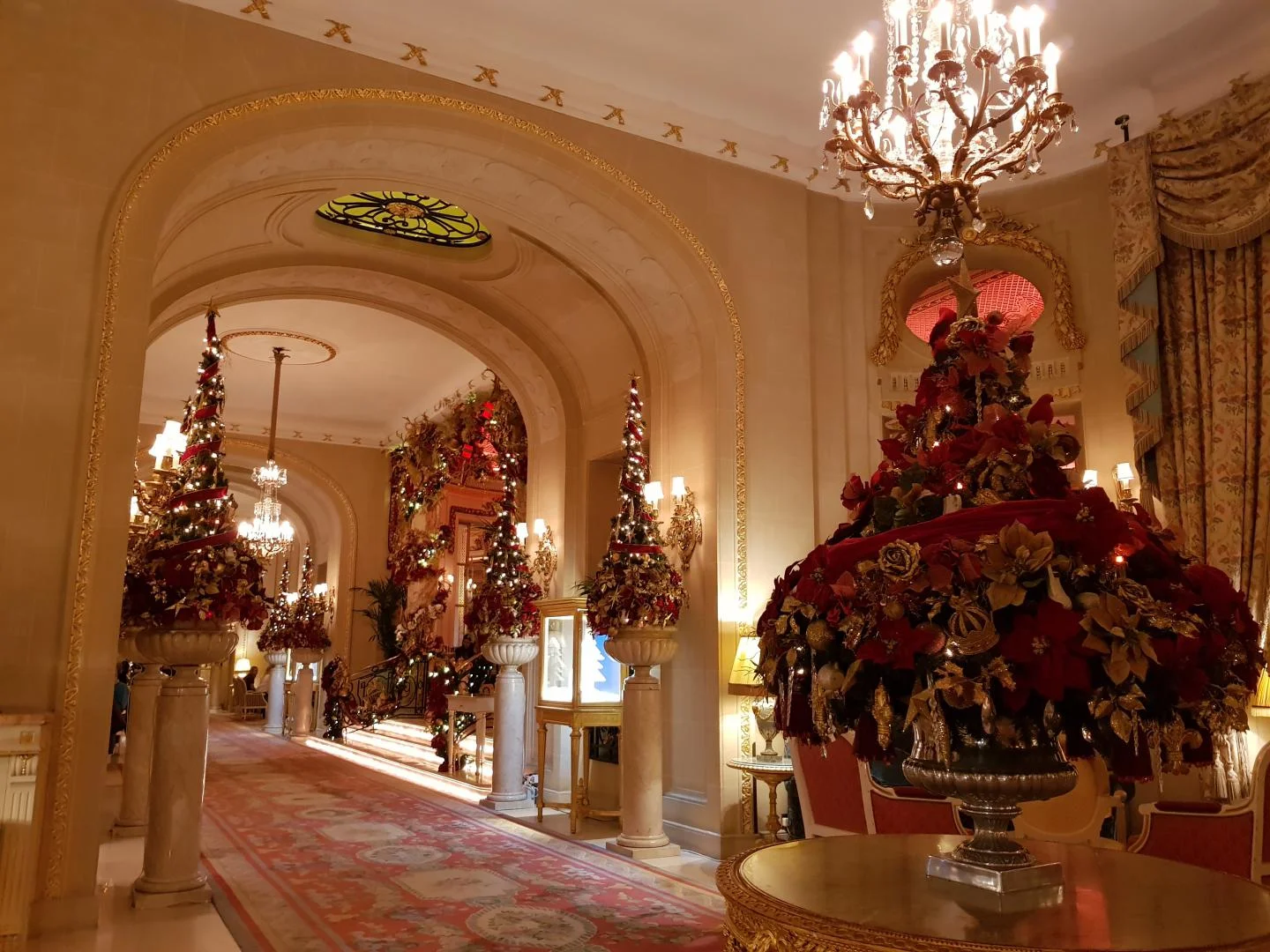 The Ritz London Piccadilly facade decorated with festive wreaths and lights
